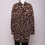 Chemise longue avec boucle au col