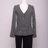 Blouse rayée à volant bas