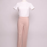 Pantalon cigarette taille haute à fermeture latérale dorée