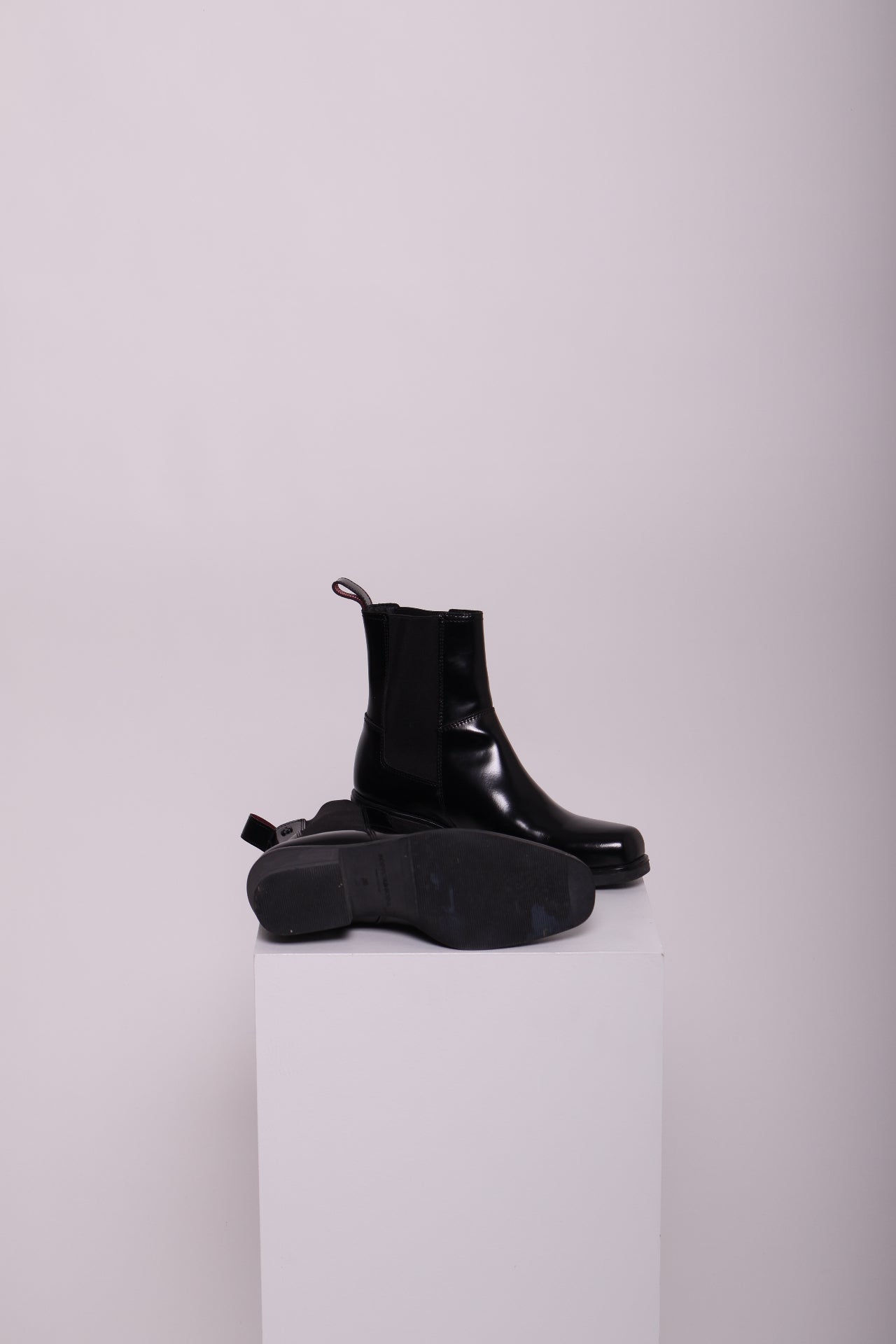 Bottes en cuir brillant à talon carré