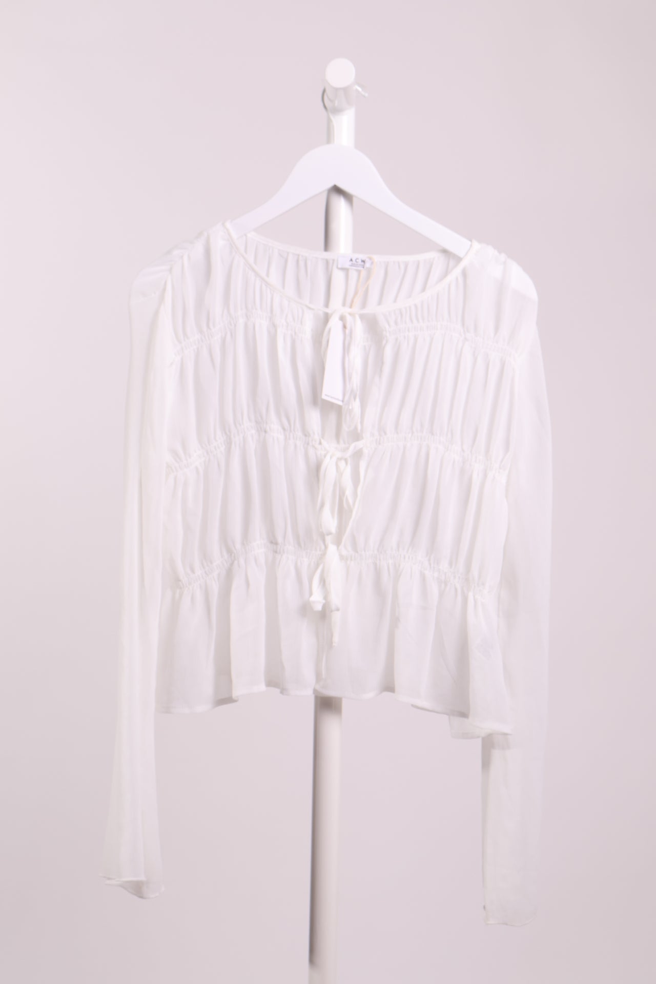 Cardigan transparent froncée à lacets