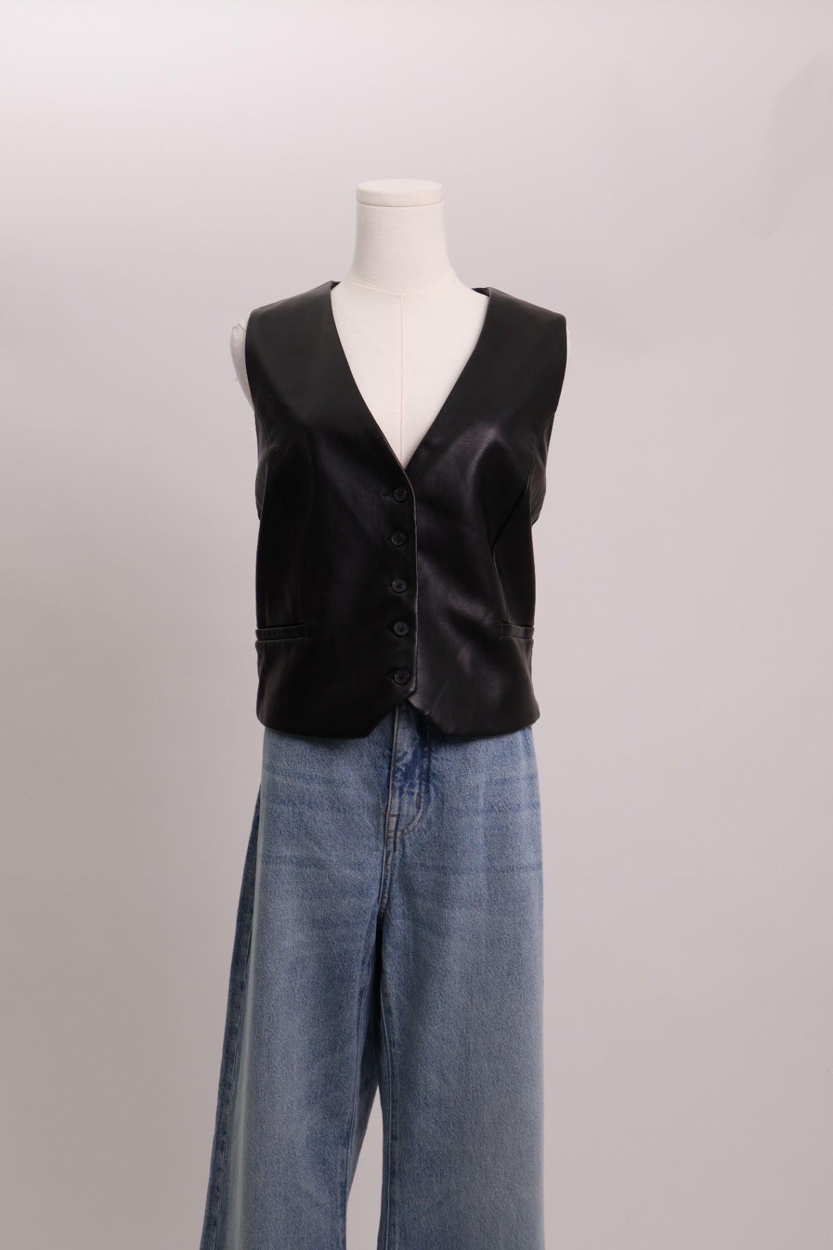 Veste sans manches en cuirette
