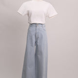 Jean bleu pâle ligné blanc taille haute