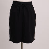 Jupe courte simple ajustable avec cordon
