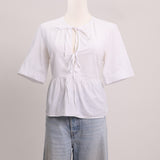 Chemise avec cordes noués