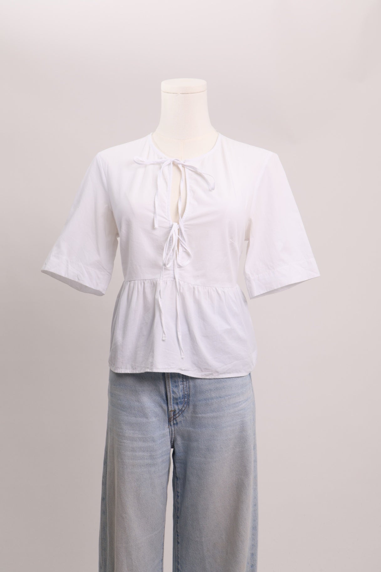 Chemise avec cordes noués