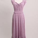 Robe longue fleurie ceintrée avec le bas à volants