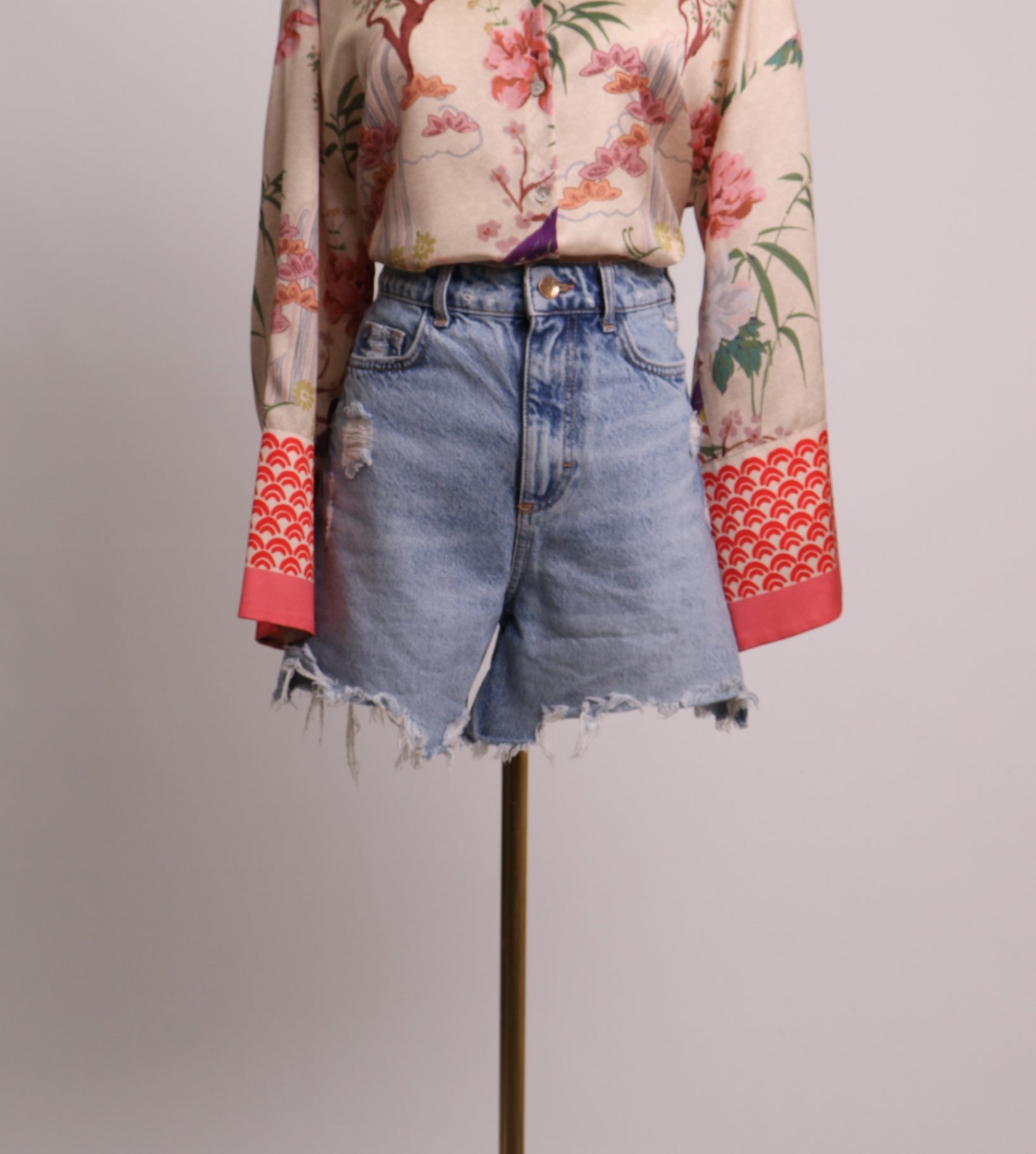 Short en jeans taille haute et effiloché