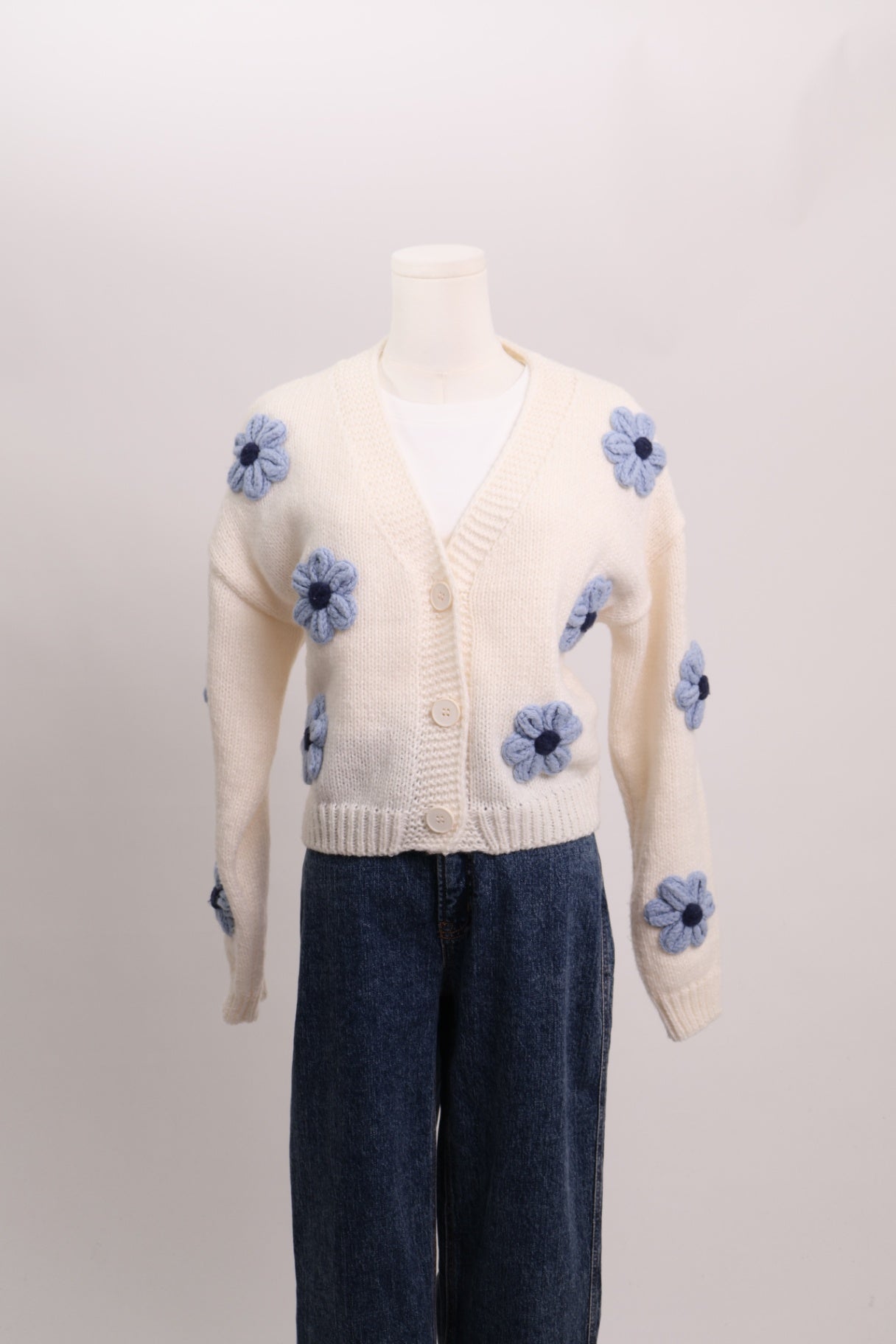 Cardigan en tricot à fleurs 3D