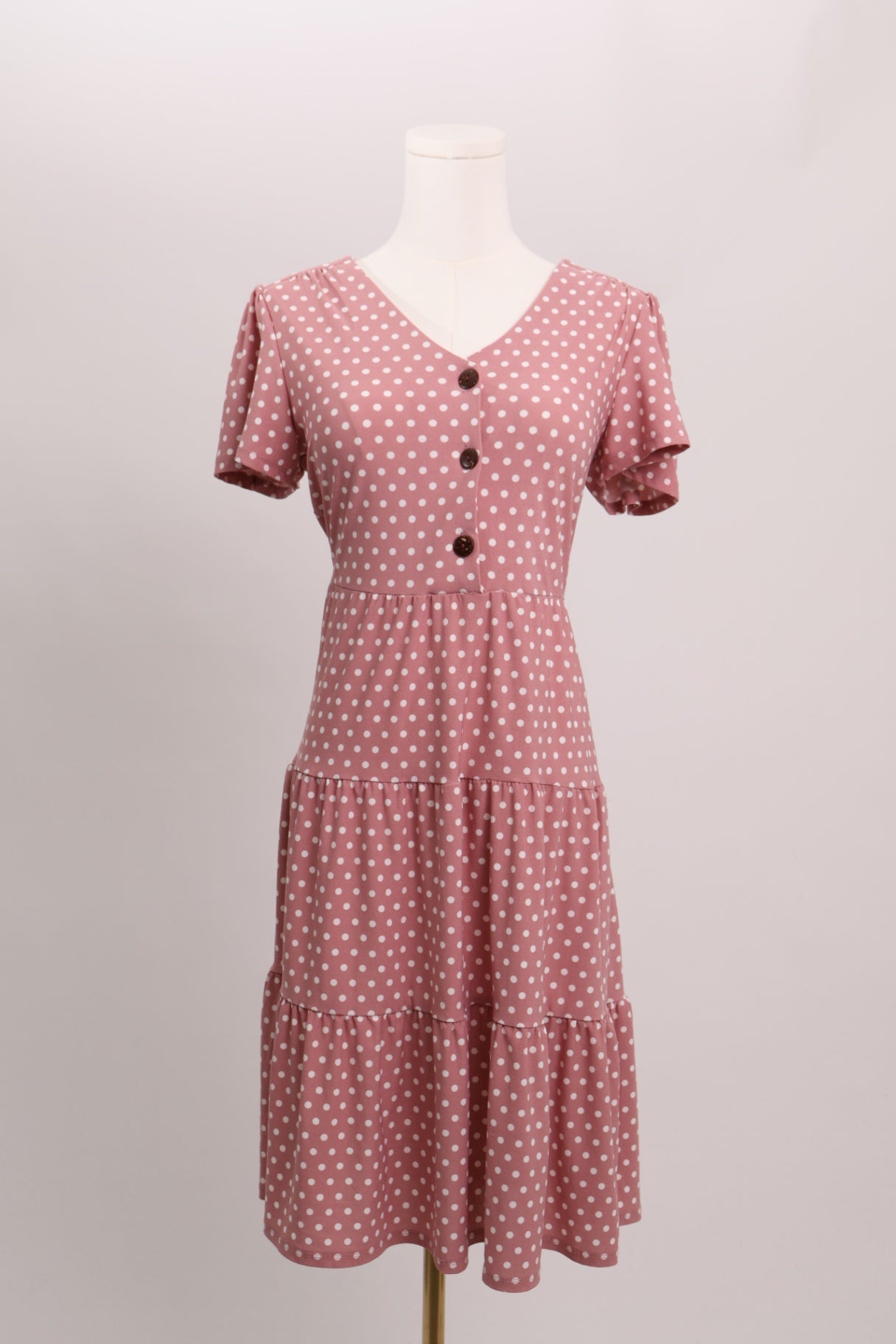 Robe midi rose à pois blancs