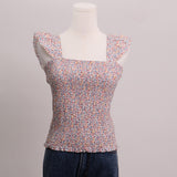 Camisole à fleurs en nid d'abeille