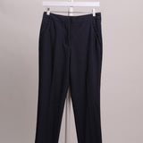 Pantalon propre ajusté avec détails