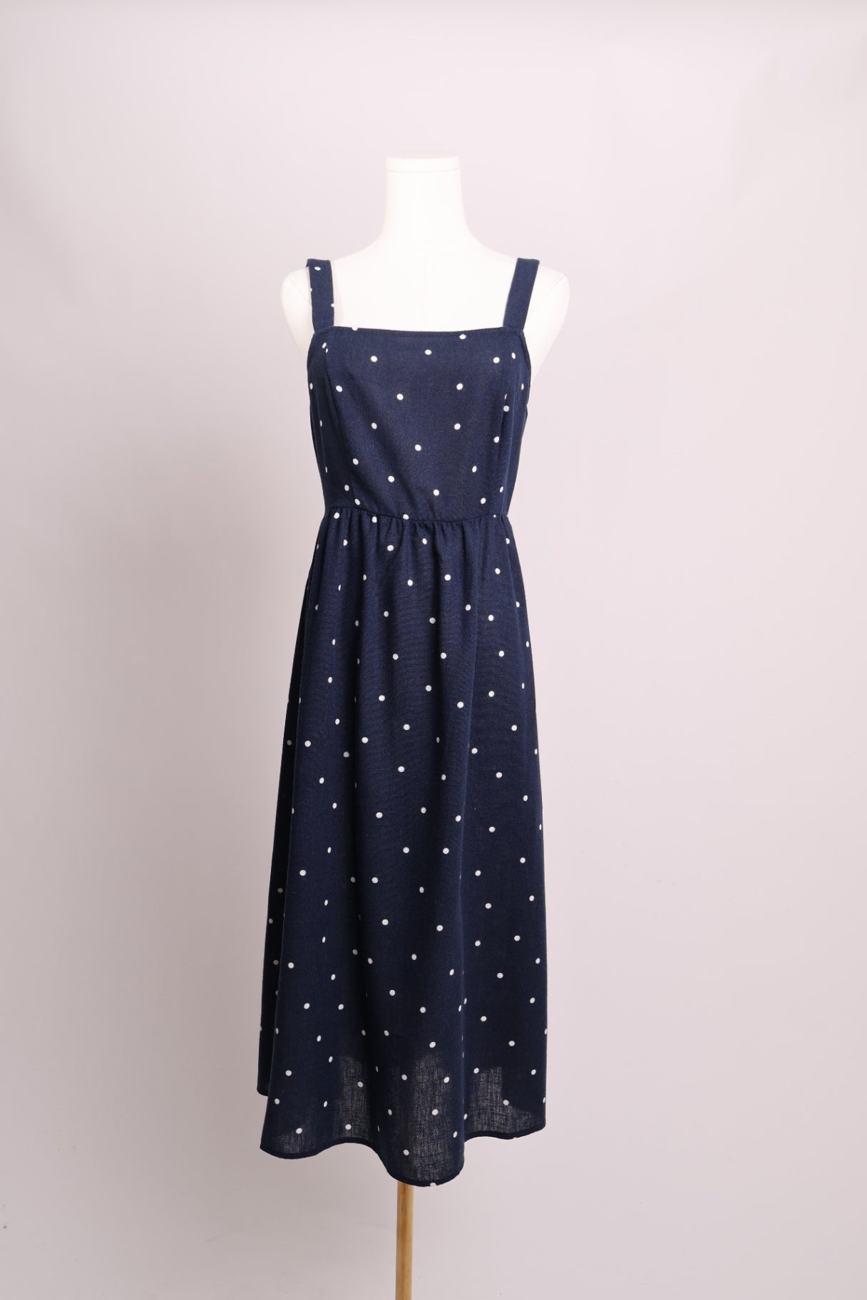 Robe midi marine à pois avec dos ouvert noué