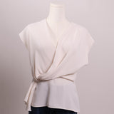 Blouse ivoire sans manche
