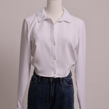 Blouse courte avec noeud à l'arrière