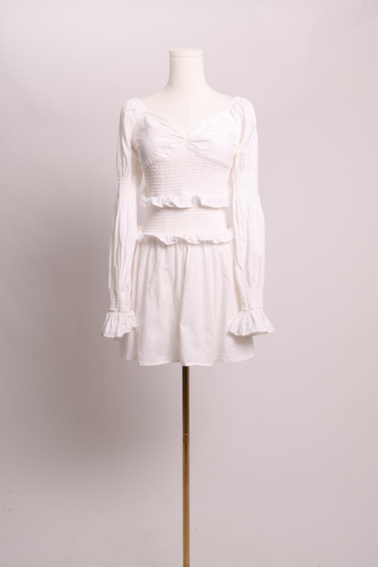 Robe courte à manches longues