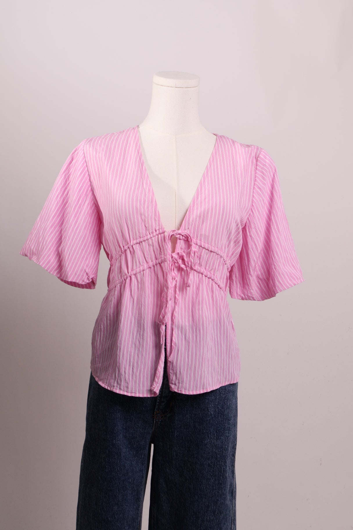 Blouse rose double nœud