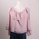 Blouse fluide à volants et à manches bouffantes