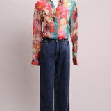 Blouse florale en soie semi-transparente