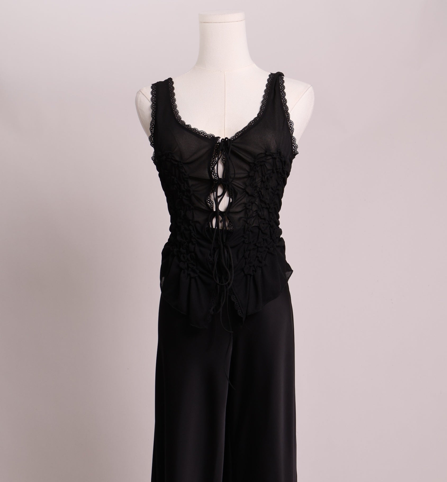 Camisole transparente froncée à boucles