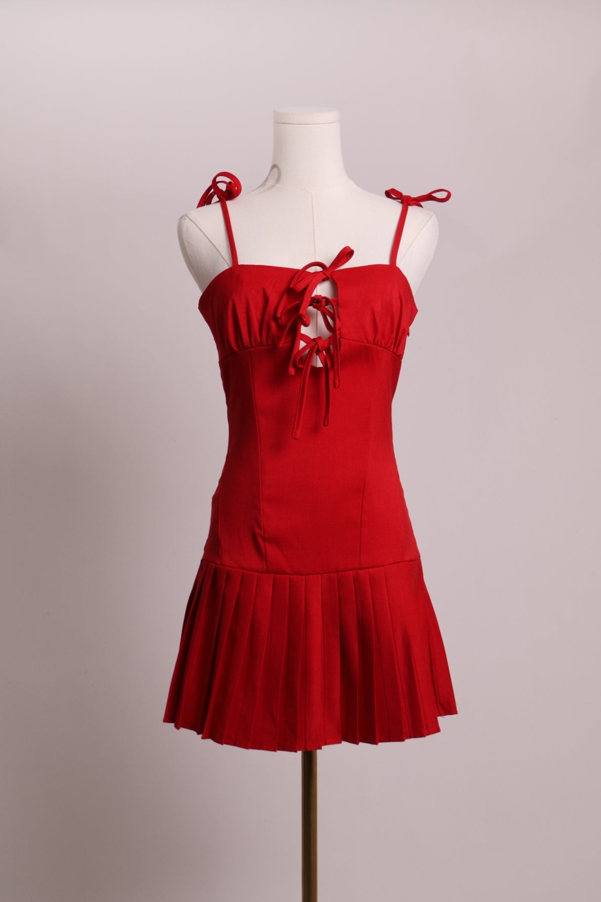 Robe à boucles et froncée au bas