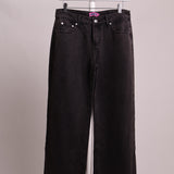 Jeans à jambes larges avec boucles rose