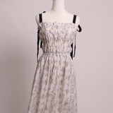 Robe fleurie à bretelles boucles contrastantes