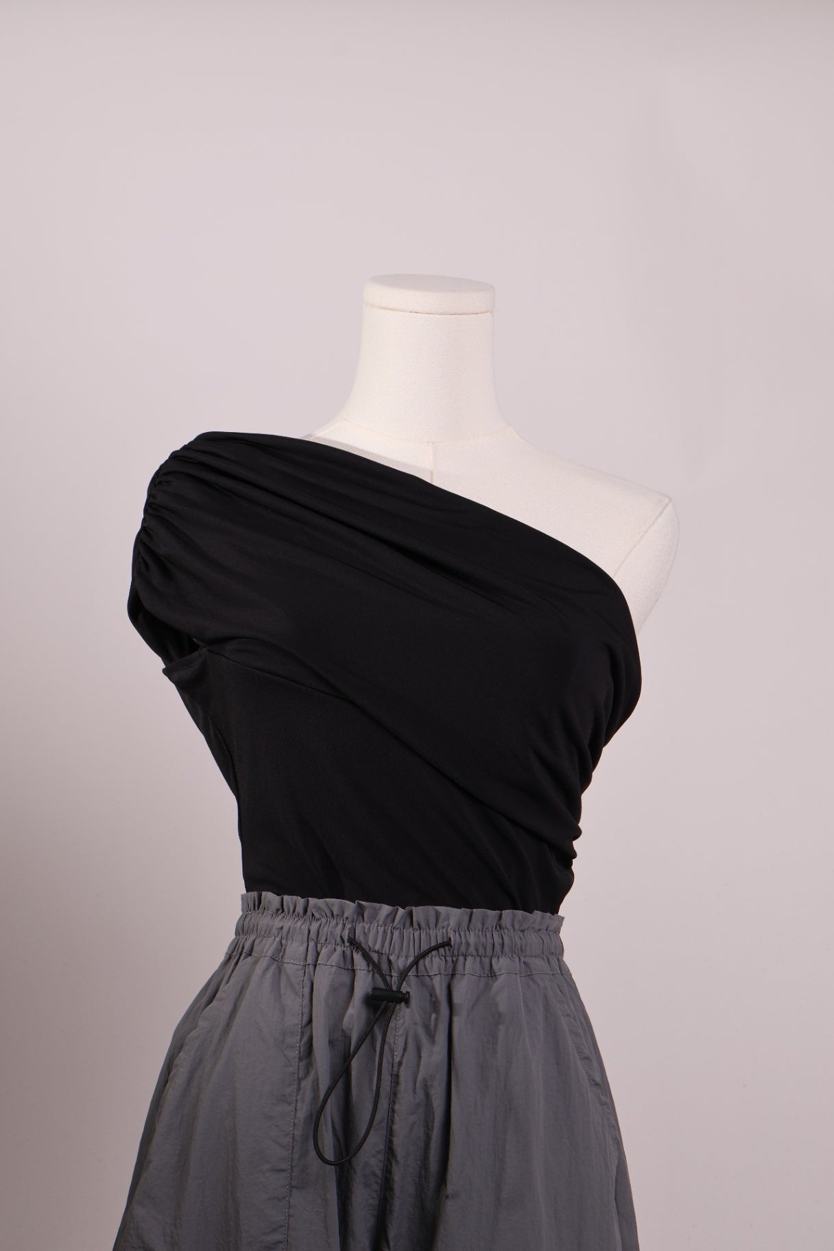Justaucorps (bodysuit) asymétrique