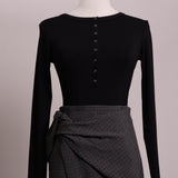 Justaucorps (bodysuit) manches longues et boutons pressions