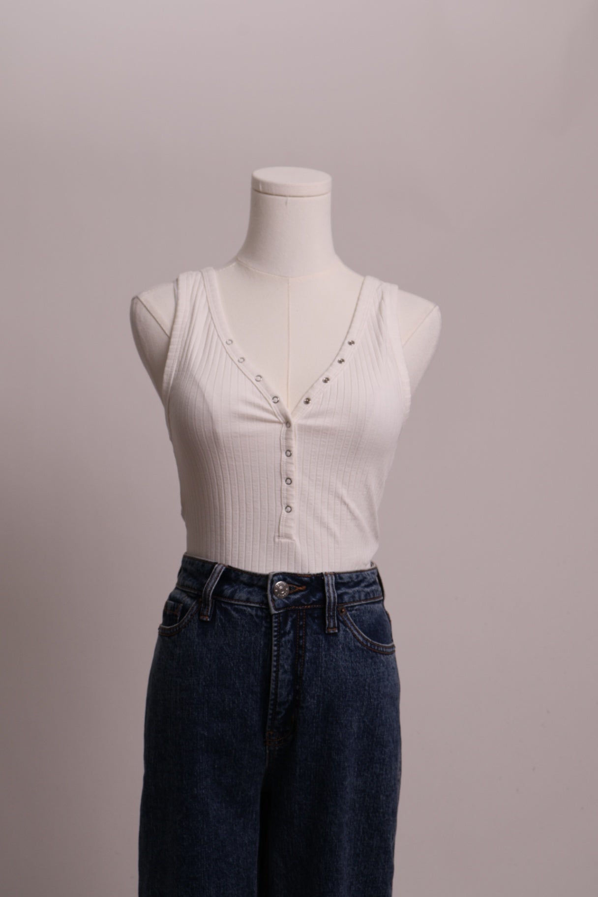 Justaucorps (bodysuit) tissu côtelé et boutons pressions