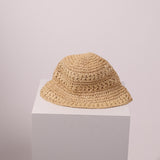 Chapeau cloche en maille tressée