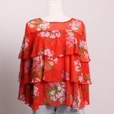 Blouse à volants manches mi-longues