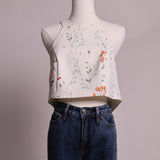 Camisole crop à bretelles fines et motif fleuri