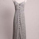 Robe maxi fleuri et boutonnée avec bretelles fines 