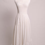 Robe d'été avec jupe à volants et nid d'abeille