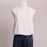 Camisole fluide ceintrée dans le bas