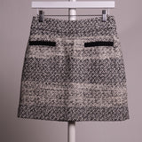 Jupe courte en tweed noire et blanche