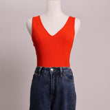 Justaucorps (bodysuit) rouge avec col en V