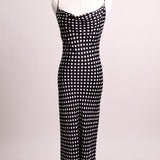 Robe longue noire à pois blancs