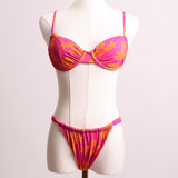 Maillot 2 pièces rose avec fleurs oranges