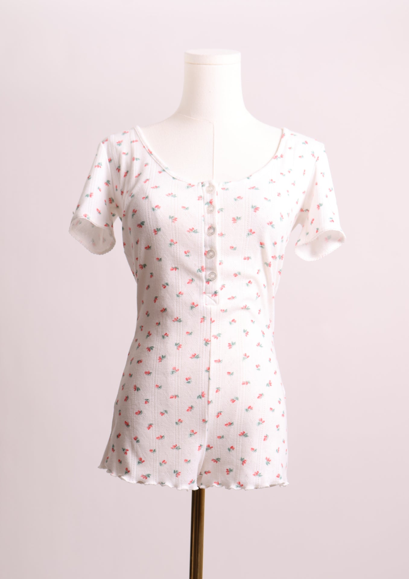 Combinaison-pyjama crème avec petites fleurs roses