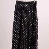 Jupe longue plissée noire à pois multicolores