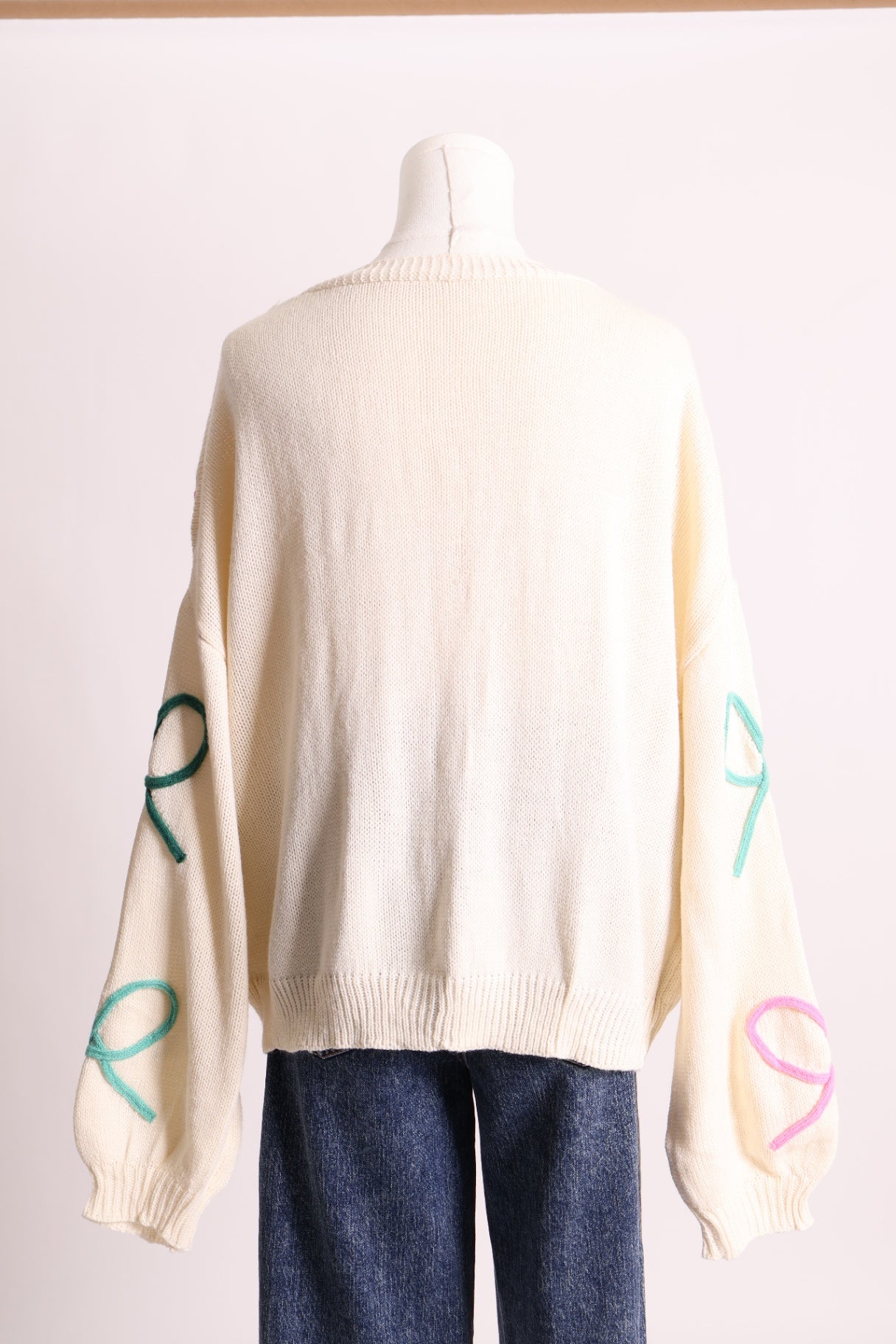 Cardigan en tricot avec motif de boucles