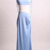 Robe longue avec dentelle et ouverture sur un côté