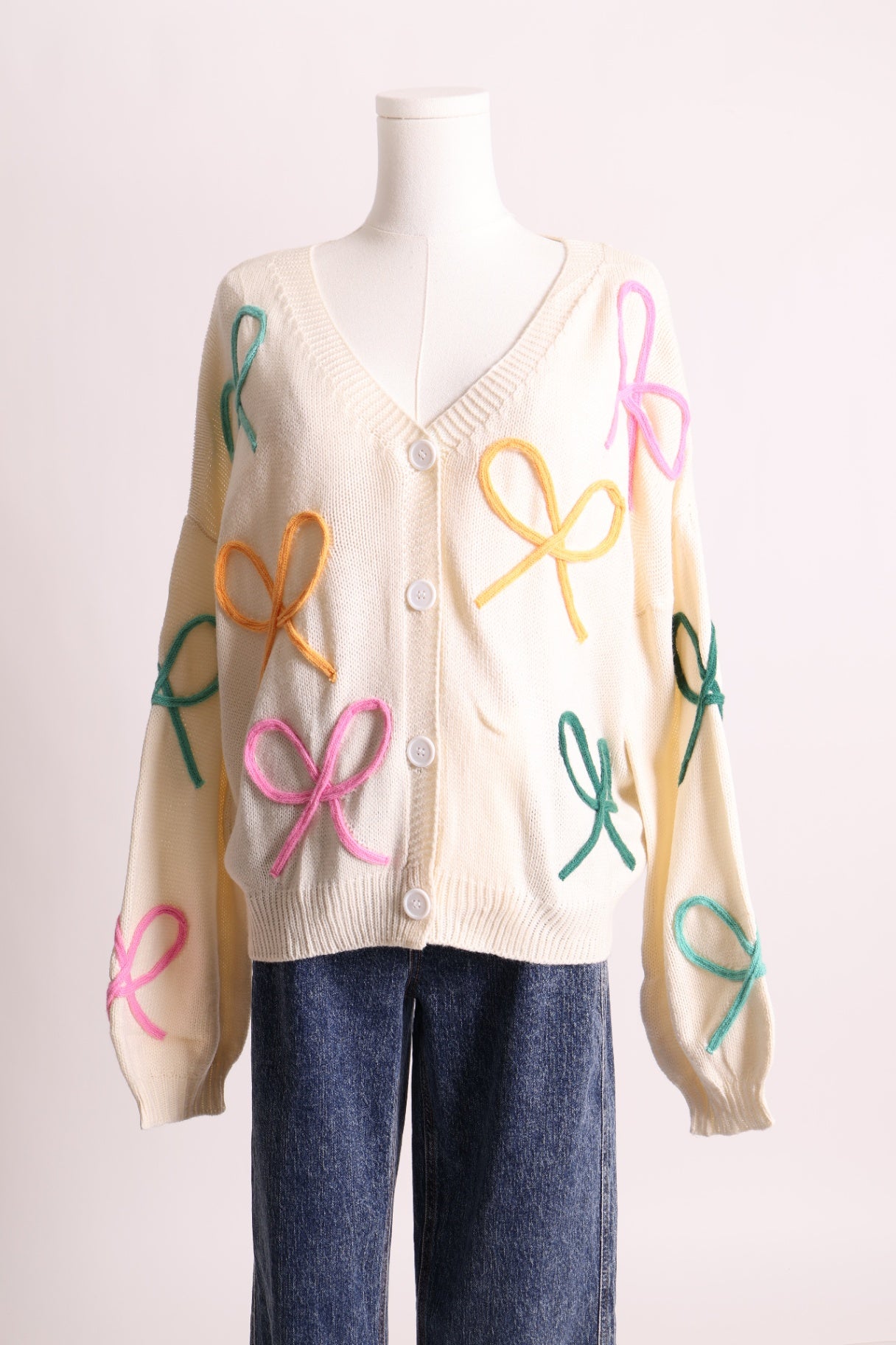 Cardigan en tricot avec motif de boucles