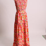 Robe fleurie avec nid d'abeille au devant et bretelles à boucles