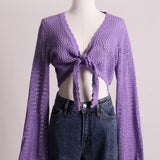 Veste en tricot style crop top avec manches larges