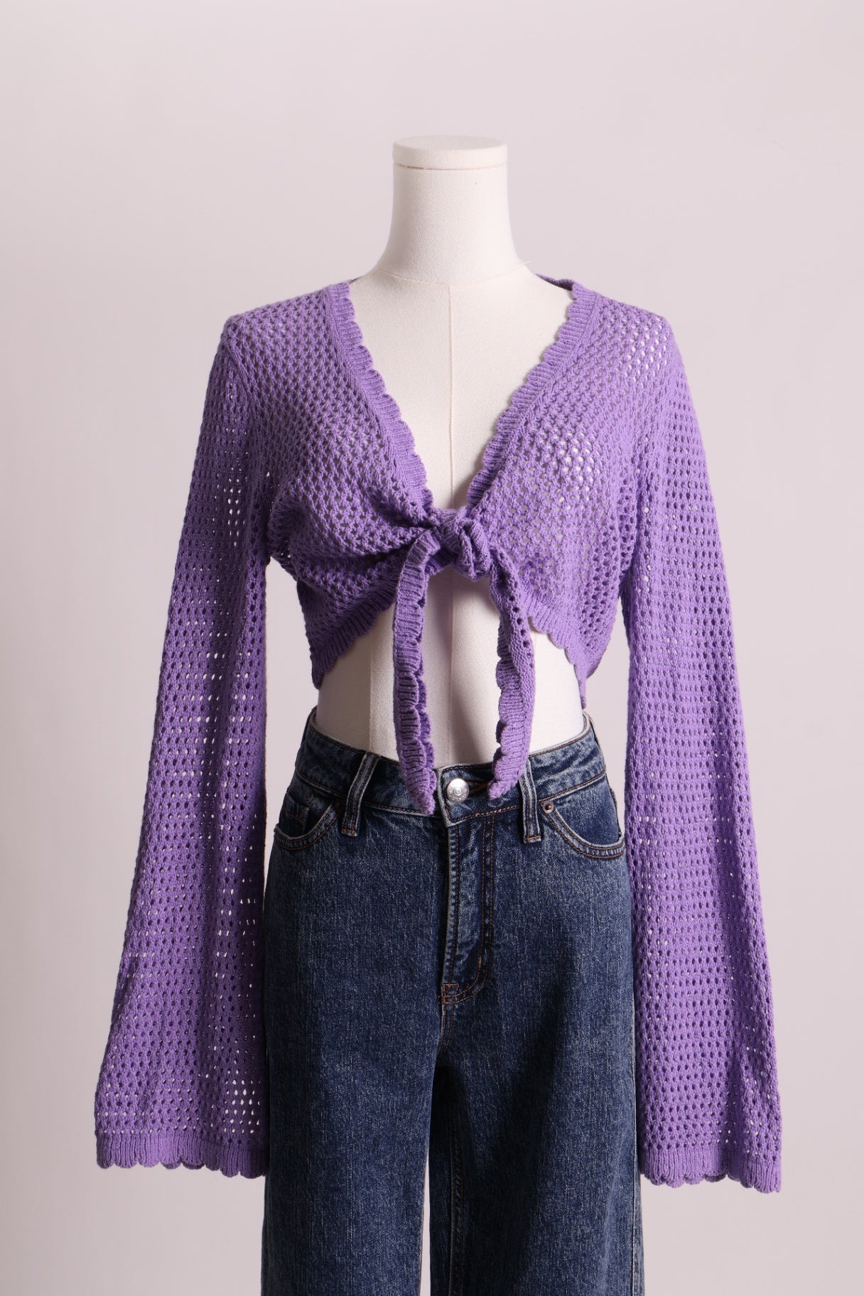Veste en tricot style crop top avec manches larges