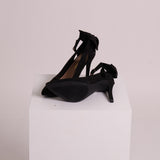 Talons hauts avec boucles noires