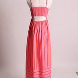 Robe fluide avec cut-out au dos et rayures horizontales et verticales